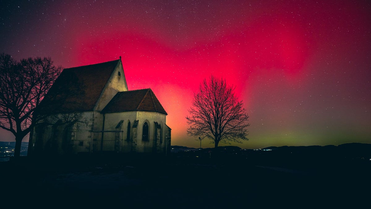 Best Northern Lights photos as aurora borealis creates stunning images in skies over UK and Europe